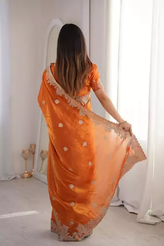 Orange silk blend embroidered saree with thread work