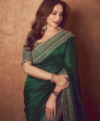 Green silk blend embroidered saree with sequins work 1