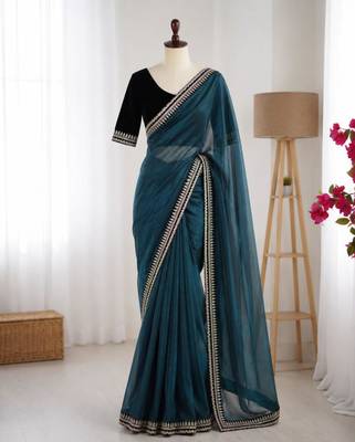 Teal net embroidered saree with sequins work 1