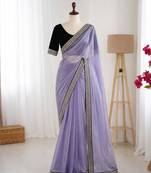 Lavender net embroidered saree with sequins work
