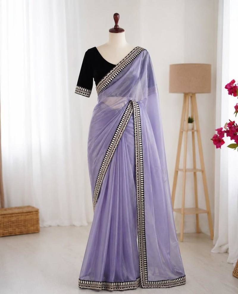 Lavender net embroidered saree with sequins work