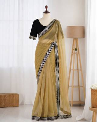 Yellow net embroidered saree with sequins work 1