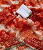 Orange silk blend printed saree with tie dye