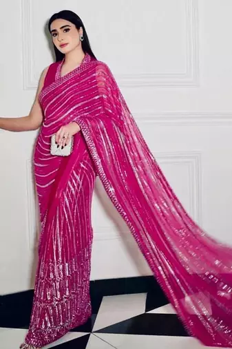 Rani pink georgette sequins thread & dori work saree with unstitched japan satin blouse