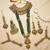 Green 2-layer bridal jewelry set with earrings, maang tikka, pasha, nath & panja | gold plated