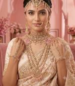 Baby pink 2-layer bridal jewelry set with earrings, maang tikka, pasha, nath & panja | gold plated