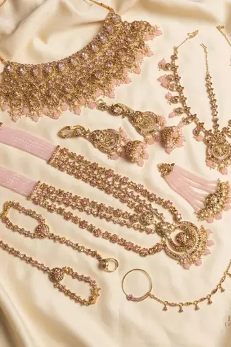 Baby pink 2-layer bridal jewelry set with earrings, maang tikka, pasha, nath & panja | gold plated