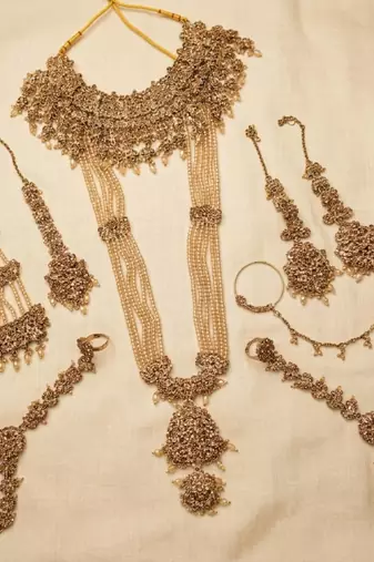 Champion color 2-layer bridal jewelry set with earrings, maang tikka, pasha, nath & panja | gold plated