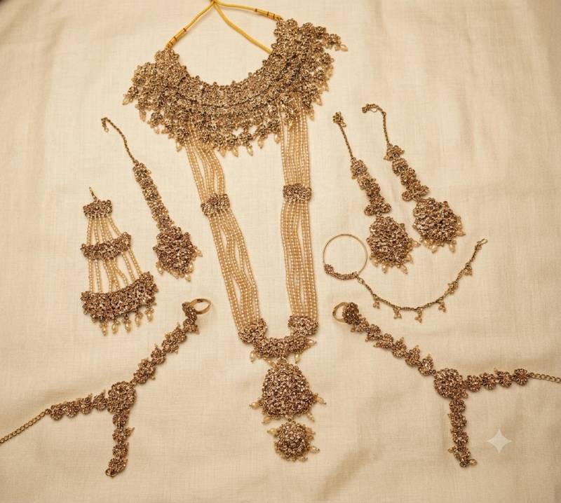 Champion color 2-layer bridal jewelry set with earrings, maang tikka, pasha, nath & panja | gold plated