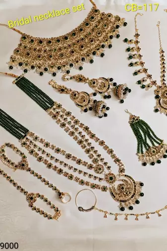 Green 2-layer bridal jewelry set with earrings, maang tikka, pasha, nath & panja | gold plated