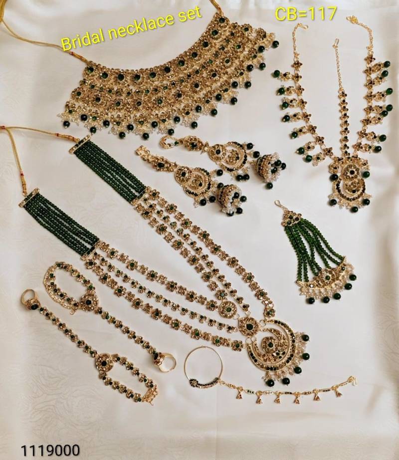 Green 2-layer bridal jewelry set with earrings, maang tikka, pasha, nath & panja | gold plated