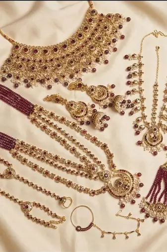 maroon 2-layer bridal jewelry set with earrings, maang tikka, pasha, nath & panja   gold plated