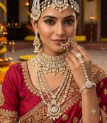 White 2-layer bridal jewelry set with earrings, maang tikka, pasha, nath & panja | gold plated