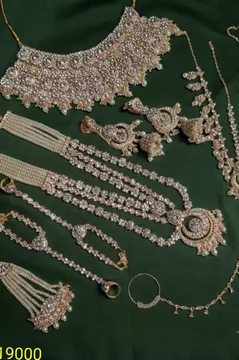 White 2-layer bridal jewelry set with earrings, maang tikka, pasha, nath & panja | gold plated