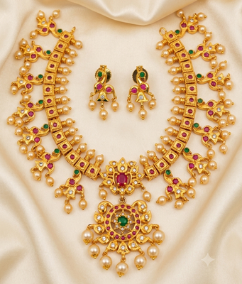 Guttapoosalu necklace set with emeralds and rubies 1