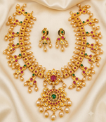 Guttapoosalu necklace set with emeralds and rubies