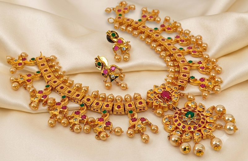 Guttapoosalu necklace set with emeralds and rubies