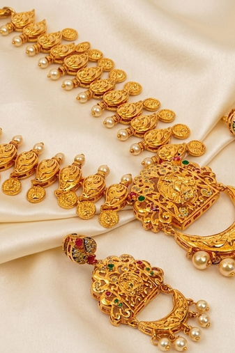Gold plated temple jewellery with rubies and emeralds