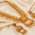 Gold plated temple jewellery with rubies and emeralds