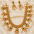 Guttapoosalu necklace set with emeralds
