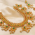 Guttapoosalu necklace set with emeralds