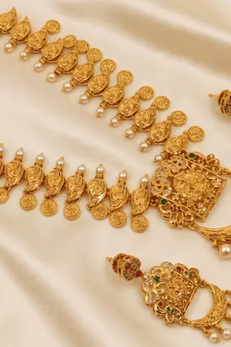 Gold plated temple jewellery with rubies and emeralds