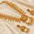 Gold plated temple jewellery with rubies and emeralds