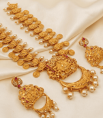 Gold plated temple jewellery with rubies