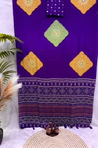 Purple color Ajarakh print with Real mirror work and Latkan Satin saree
