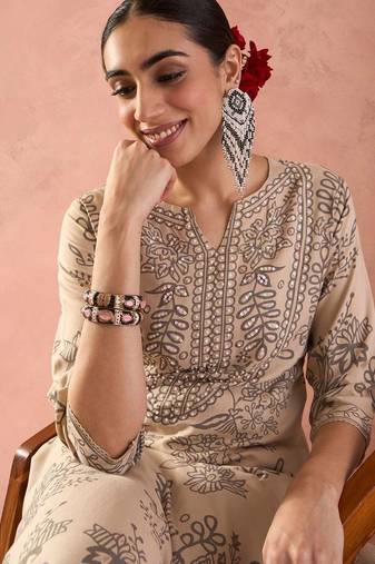 Women Ethnic Motifs Printed Regular Sequinned Kurta with Trousers