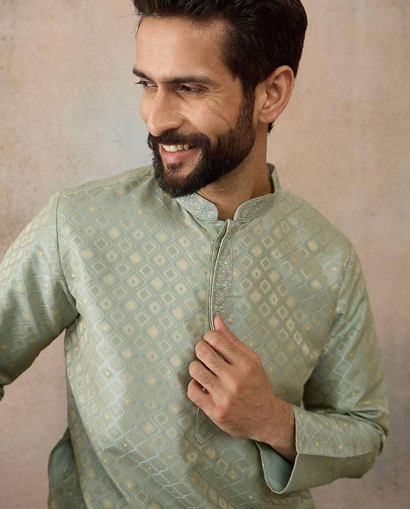 Mens teal jacquard ethnic motifs embroidered kurta with trouser