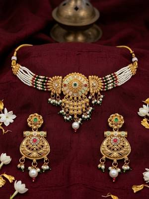 Gold-toned multi-strand pearl choker jewellery set with matching earrings 2