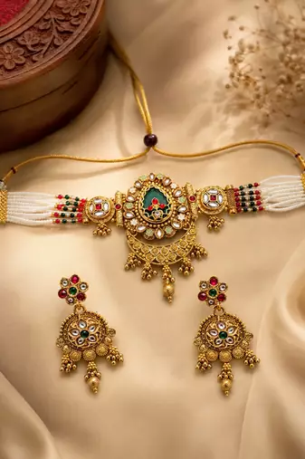 Women gold-plated kundan & pearl studded multi-strand choker jewellery set
