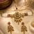Women gold-plated kundan & pearl studded multi-strand choker jewellery set