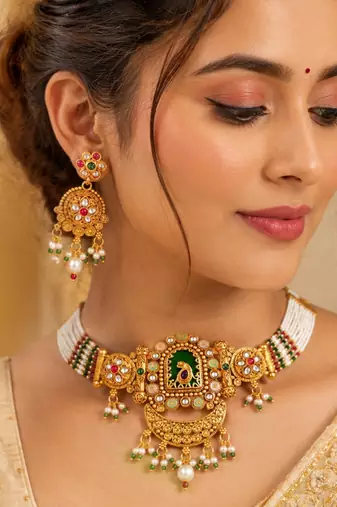 Gold-plated peacock & kundan studded choker jewellery set with earrings