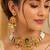 Gold-plated peacock & kundan studded choker jewellery set with earrings