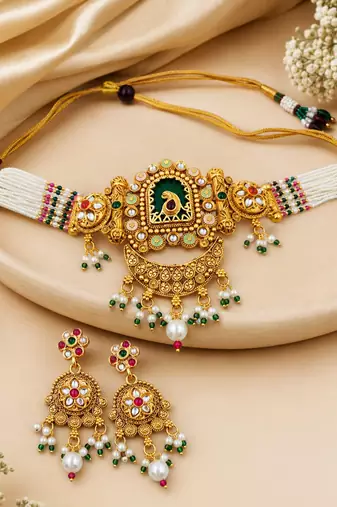 Gold-plated peacock & kundan studded choker jewellery set with earrings