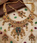 Women gold-toned & green temple antique jewellery set with maang tikka