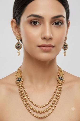 Gold-plated green meenakari & pink kundan-studded multi-strand long necklace set with earrings