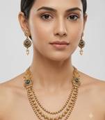 Gold-plated green meenakari & pink kundan-studded multi-strand long necklace set with earrings