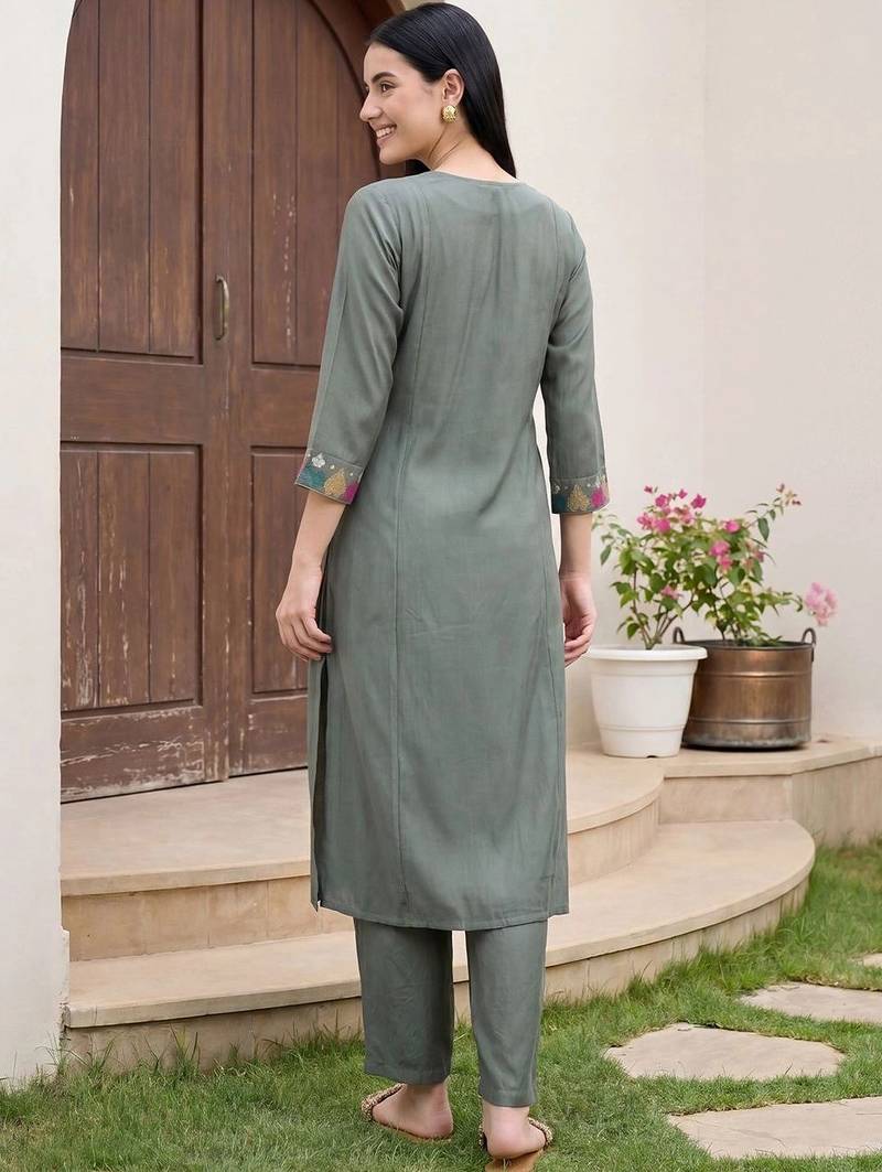 Women Embroidered Regular Thread Work Kurta with Trousers