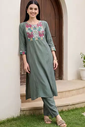 Women Embroidered Regular Thread Work Kurta with Trousers