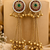 Women gold-toned & pink antique kashmiri floral stud earrings with ghungroo drop tassels