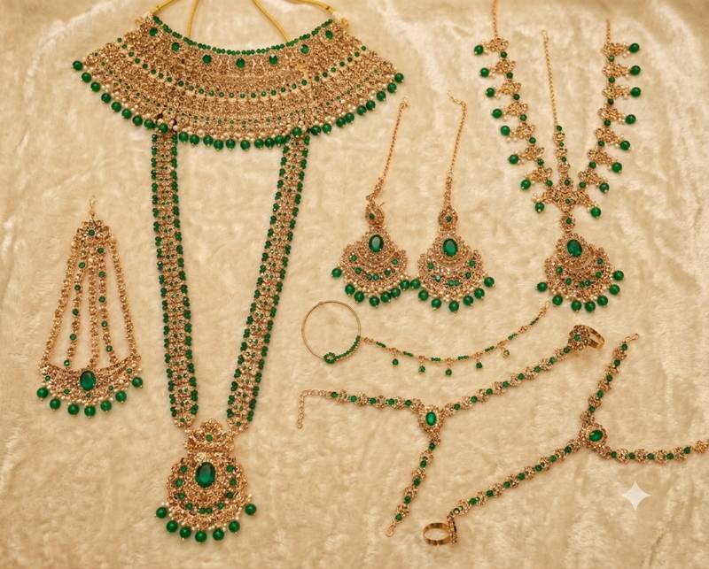 Green 2-layer bridal jewelry set with earrings, maang tikka, pasha, nath & panja | gold plated