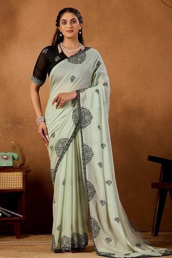 Light pista rangoli madala art embroidered saree