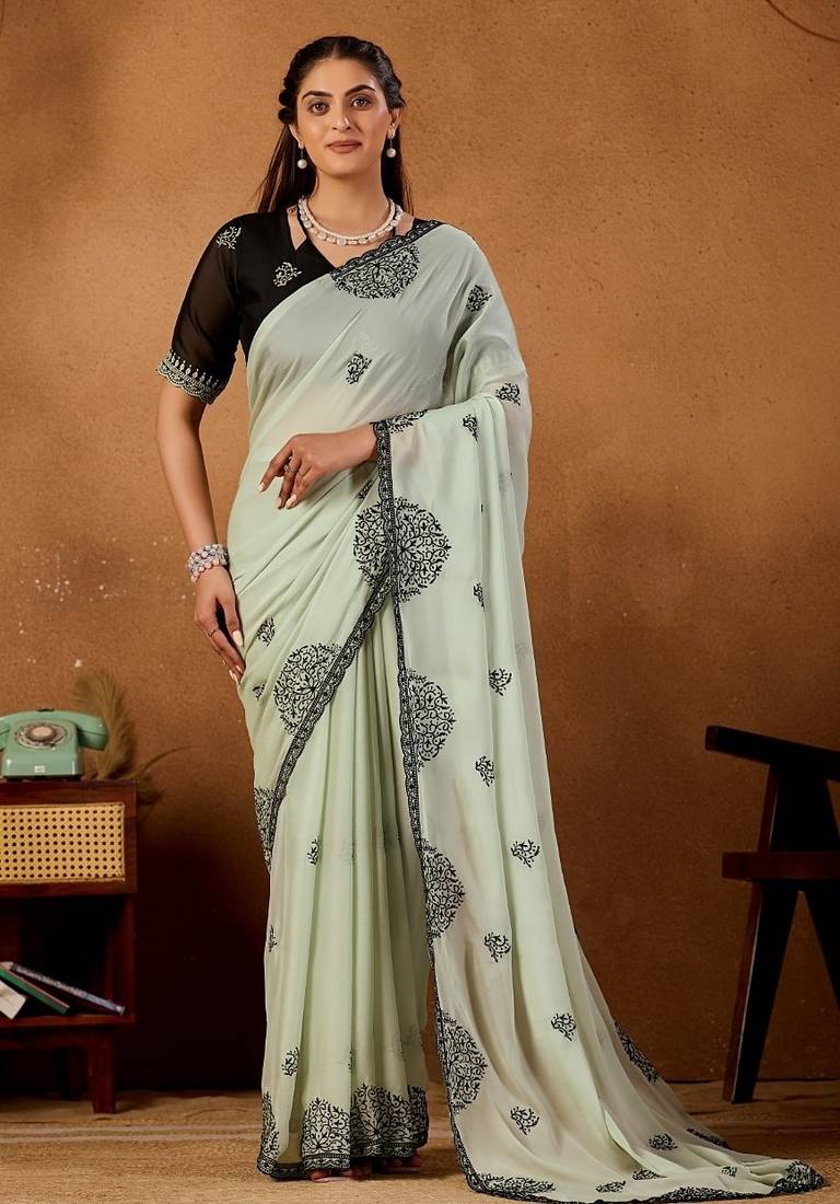 Light pista rangoli madala art embroidered saree