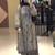 Beige faux georgette embroidered top  palazzo & dupatta suit set