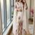 White georgette readymade suit with embroidery & sequence work