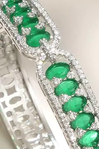 Emerald green stones diamond cut bracelet