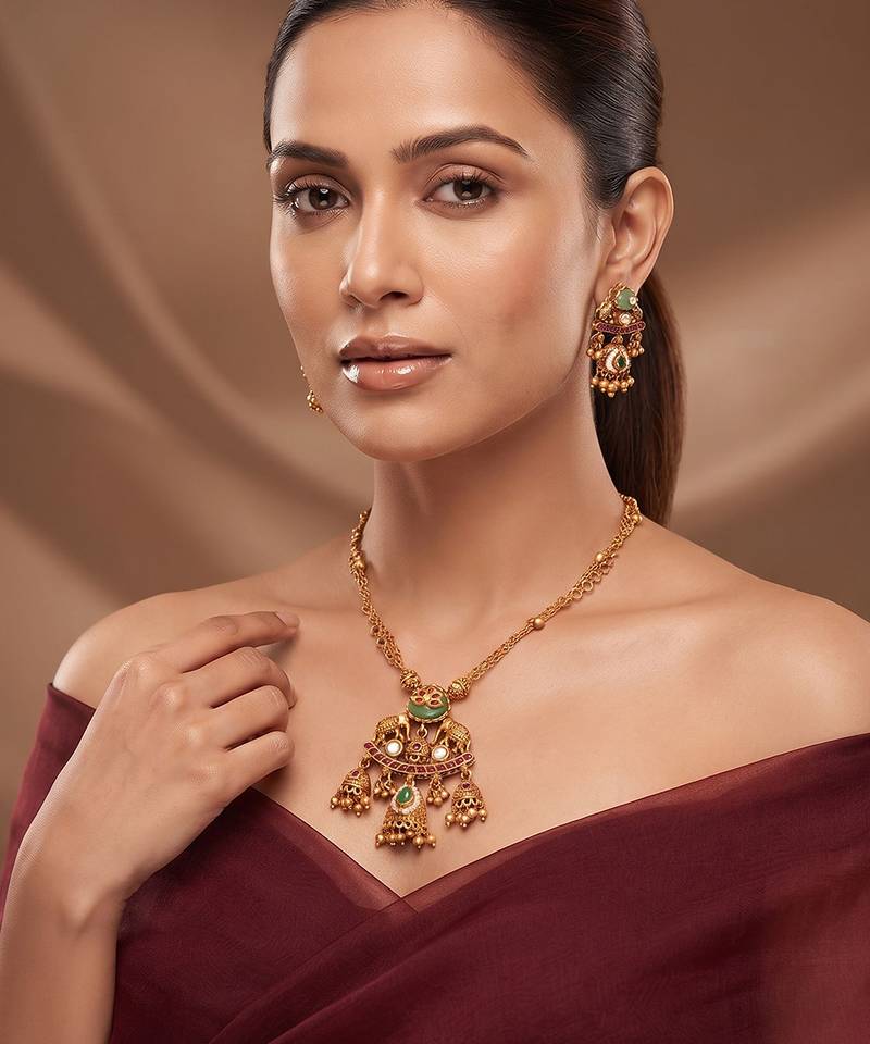 Gold plated green stones royal kundan necklace set